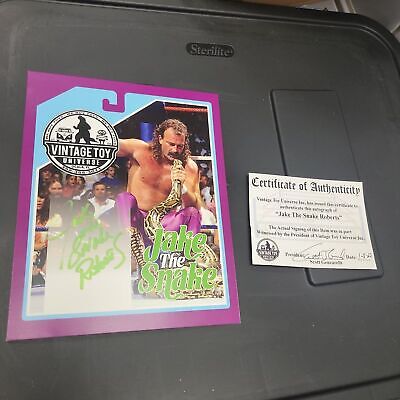 Autographed Jake "The Snake" Roberts Photo Green Signature