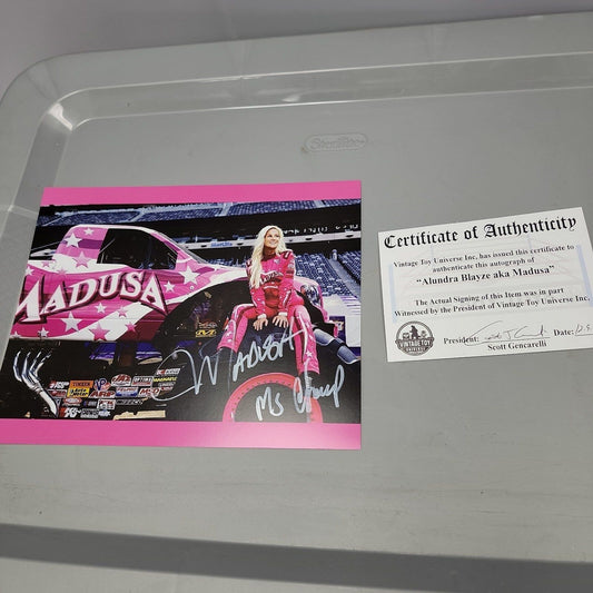 Autographed Madusa Monster Truck Photo with COA White Ink